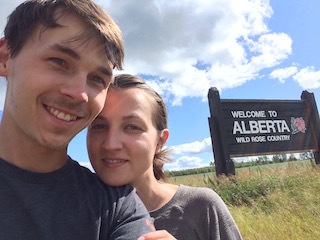 Veronika and me in front of the Alberta welcome sign