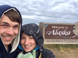 Vee and me in front of the Alaska welcome sign